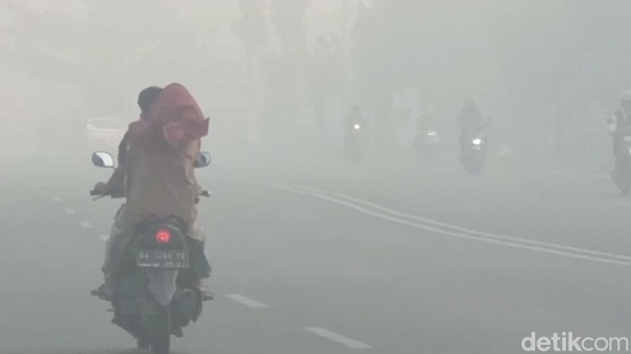 kabut asap di banjarbaru foto khairun nisa detik.com kalimantan